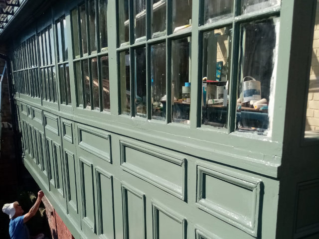 Painting a wooden sunroom